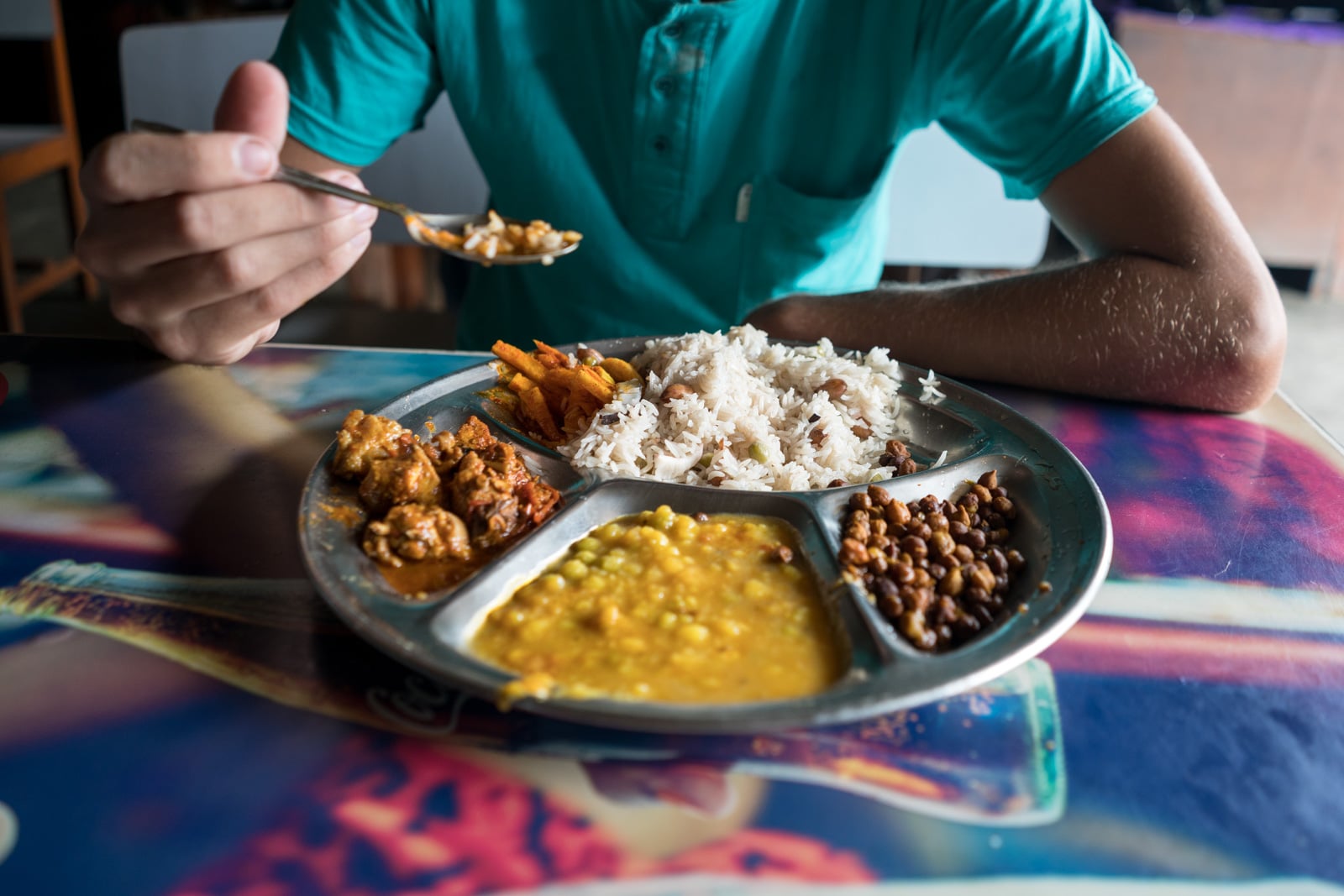 Traveling during monsoon season in Nepal - Dal bhat at a rest stop - Lost With Purpose travel blog