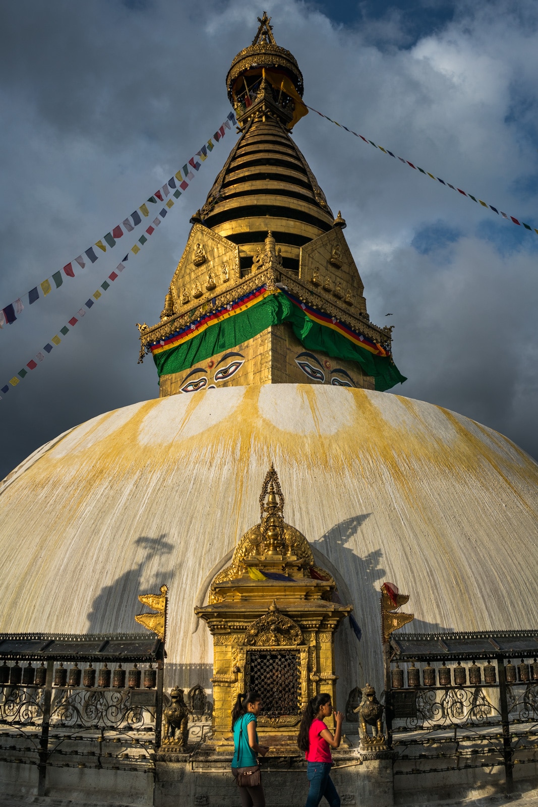 Sunset over the Buddhist stupa of Swayambhunath, more commonly known as the Monkey temple, in Kathmandu, Nepal. A top sight in Kathmandu for travelers!