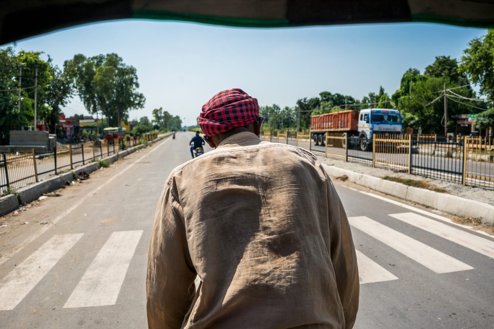 Crossing overland at the Wagah border between India and Pakistan - Cycle rickshaw to the border - Lost With Purpose travel blog