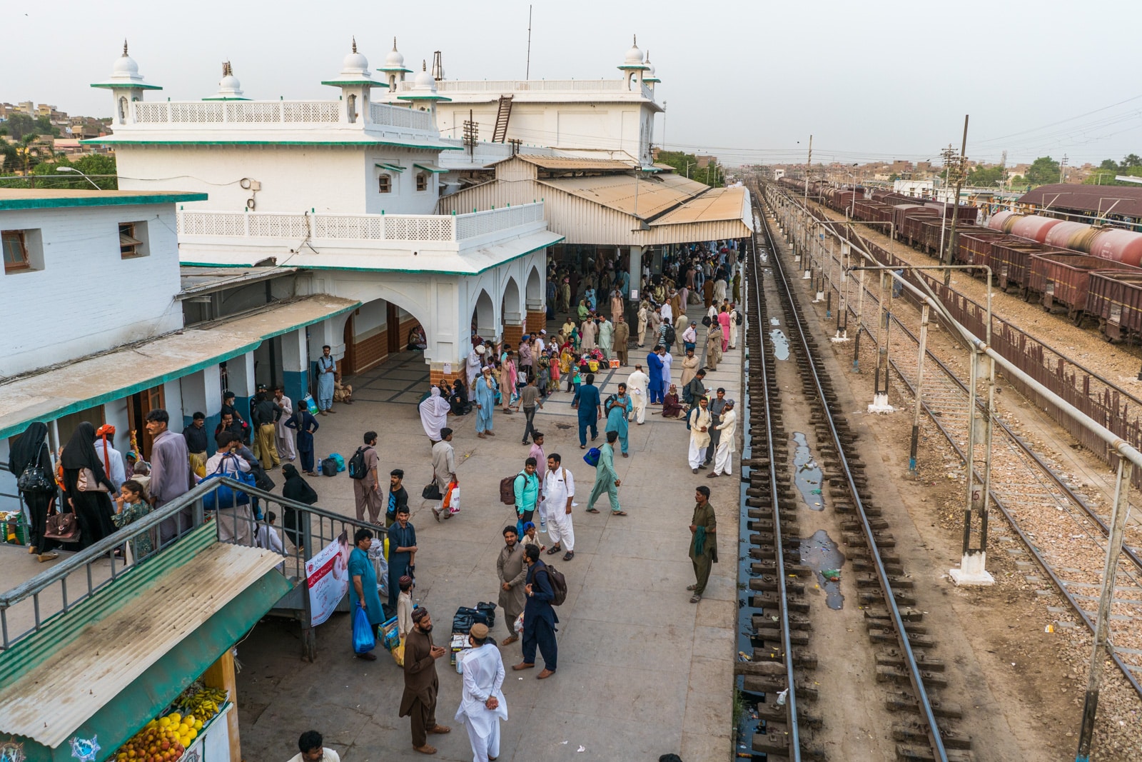 Passengers waiting for train at a train station in Hyderabad, Sindh, Pakistan