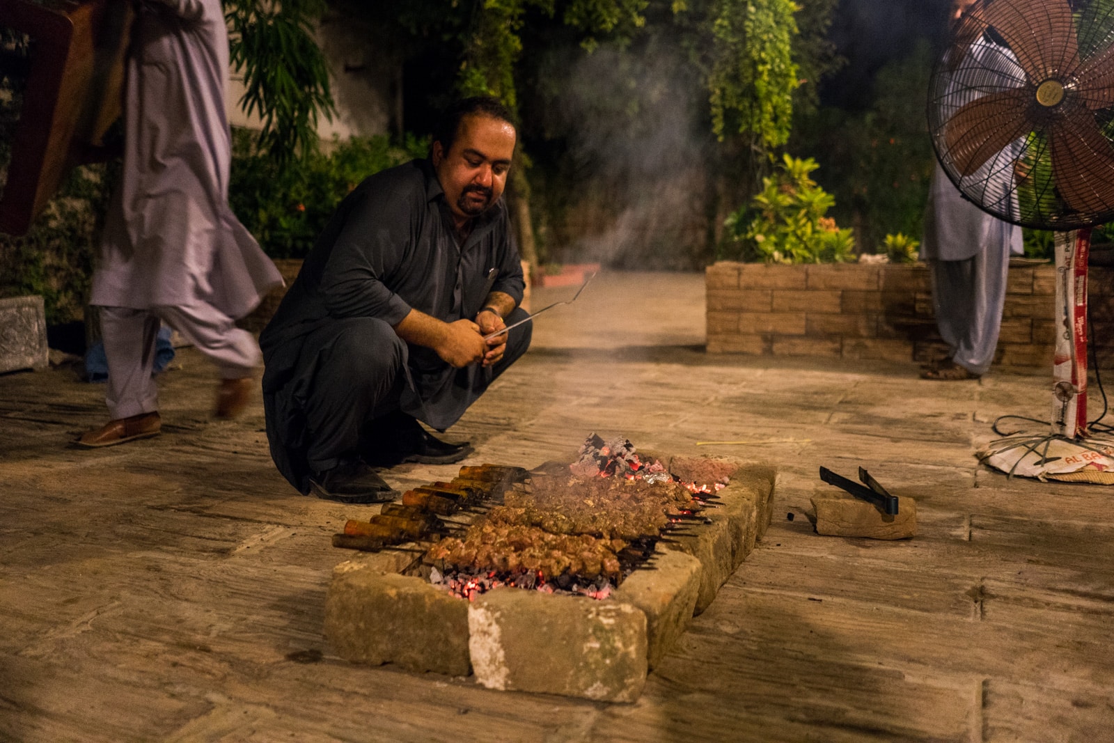 Who are the Pashtuns of Pakistan? - Hamza barbecuing - Lost With Purpose travel blog