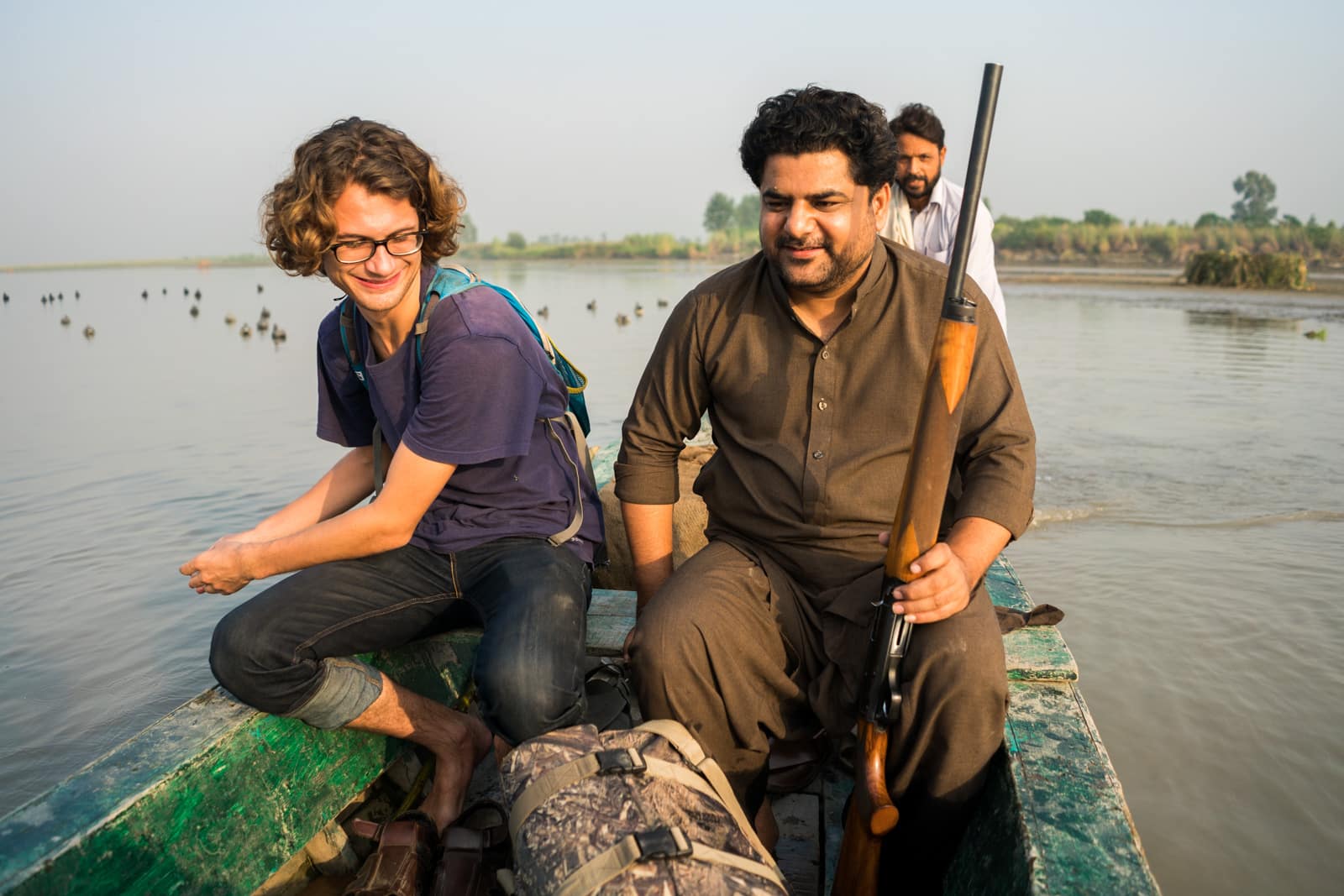 Who are Pashtuns? - Boat ride with a rifle in Mardan, Pakistan - Lost With Purpose travel blog