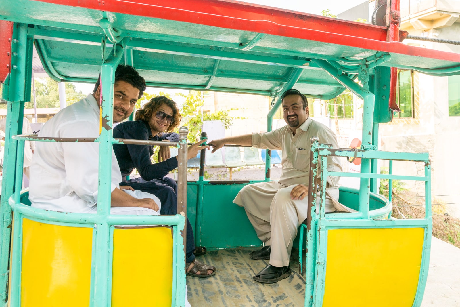 The most hospitable people in Pakistan - Group shot in a cable car over Kabul river - Lost With Purpose travel blog