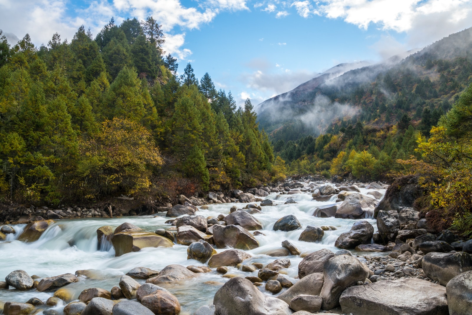 Photos of the Gasa - Laya trek in Bhutan - Long exposure of a river running past the campsite - Lost With Purpose travel blog