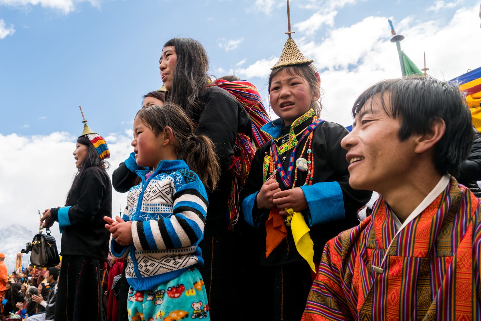 Guide to the Royal Highlander Festival in Bhutan - Excited crowd cheering - Lost With Purpose travel blog