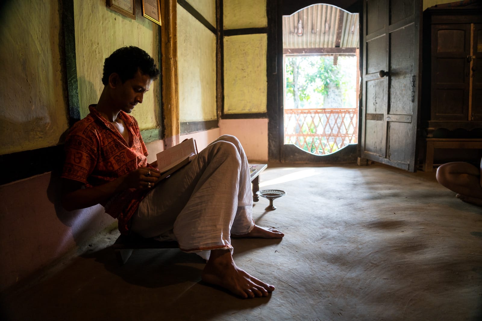 Monk studying at a Hindu satra on Majuli river island