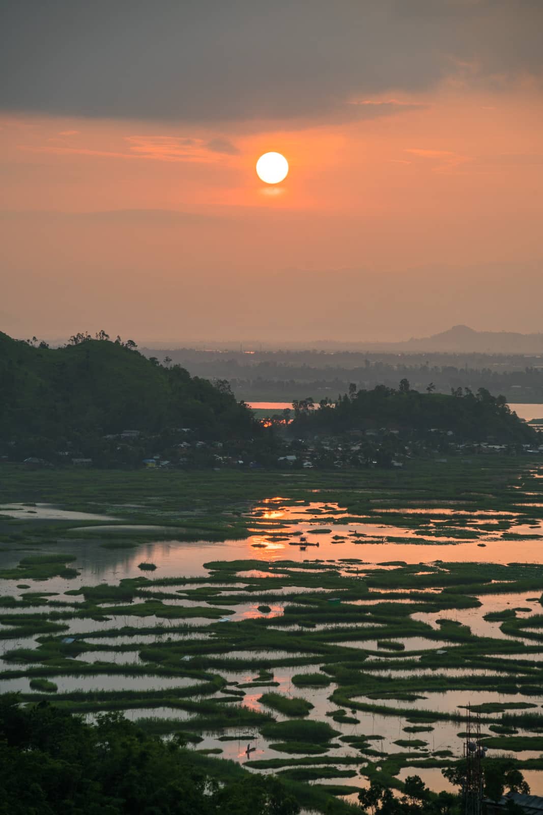 Sunrise over Loktak Lake, a peaceful offbeat destination in Manipur state, Northeast India.