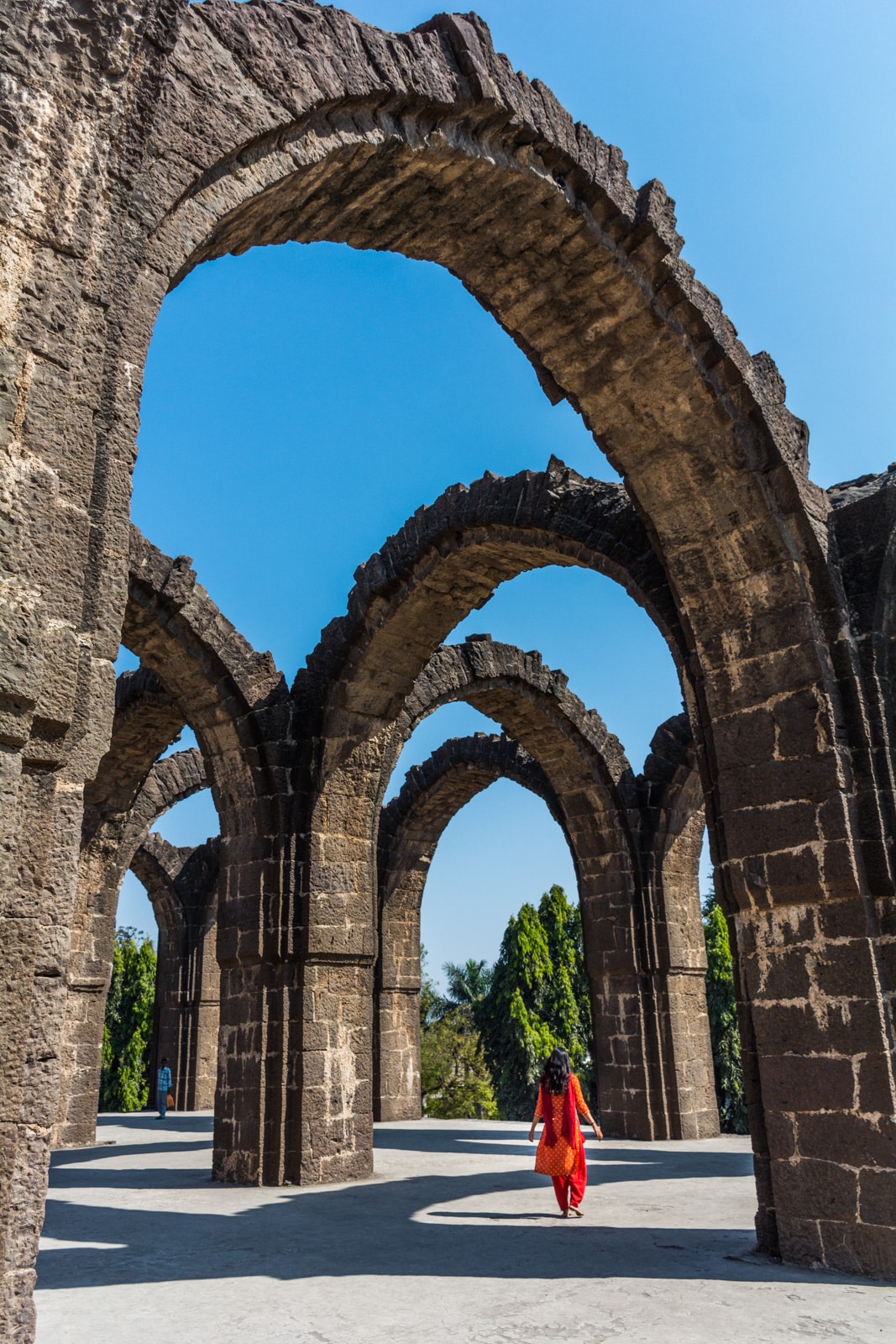 Exploring crumbling arches in Bijapur, an epic off the beaten track destination in Karnataka state, India.