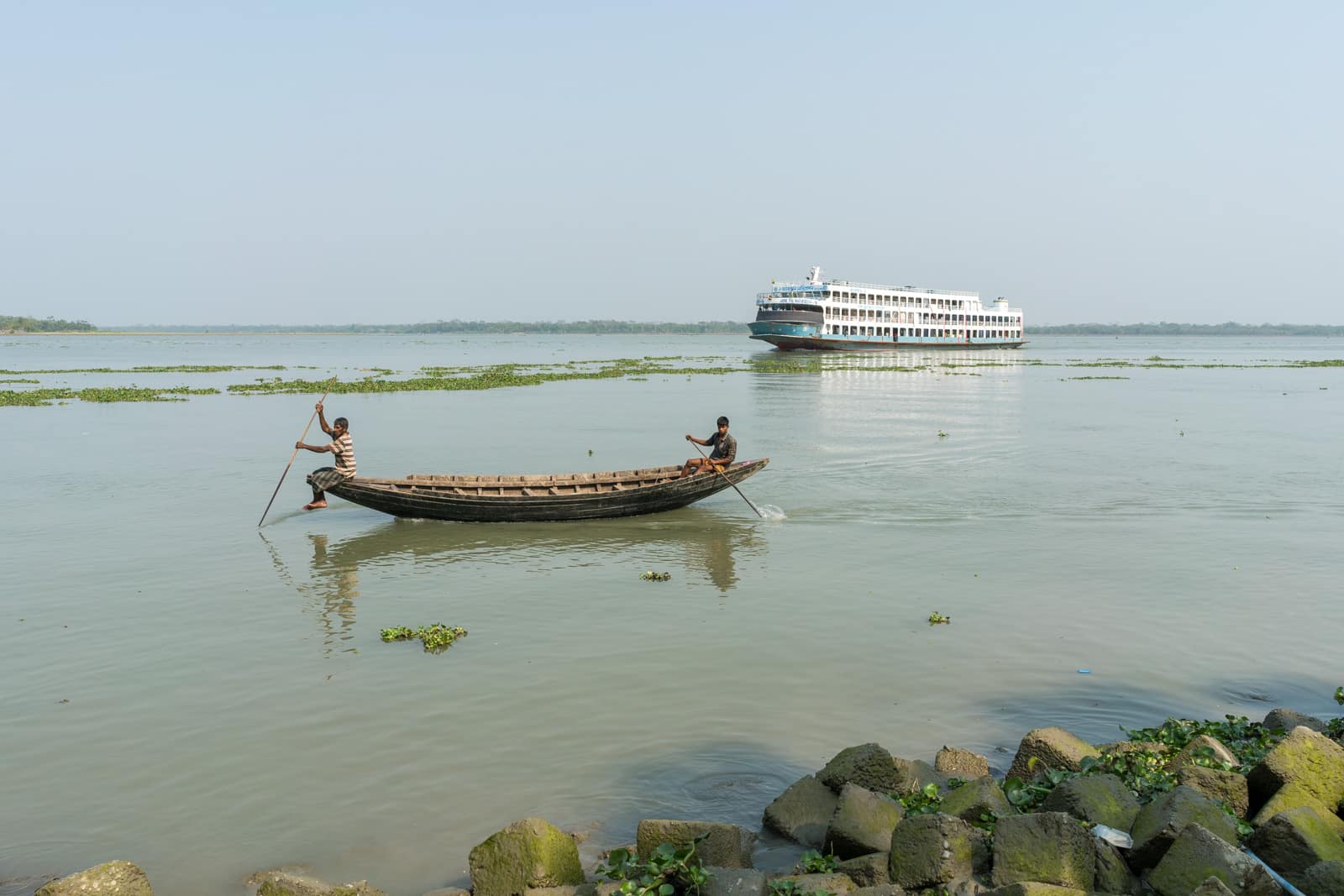 Launches from Hularhat to Dhaka, Bangladesh - Approaching launch behind a fishing boat - Lost With Purpose travel blog