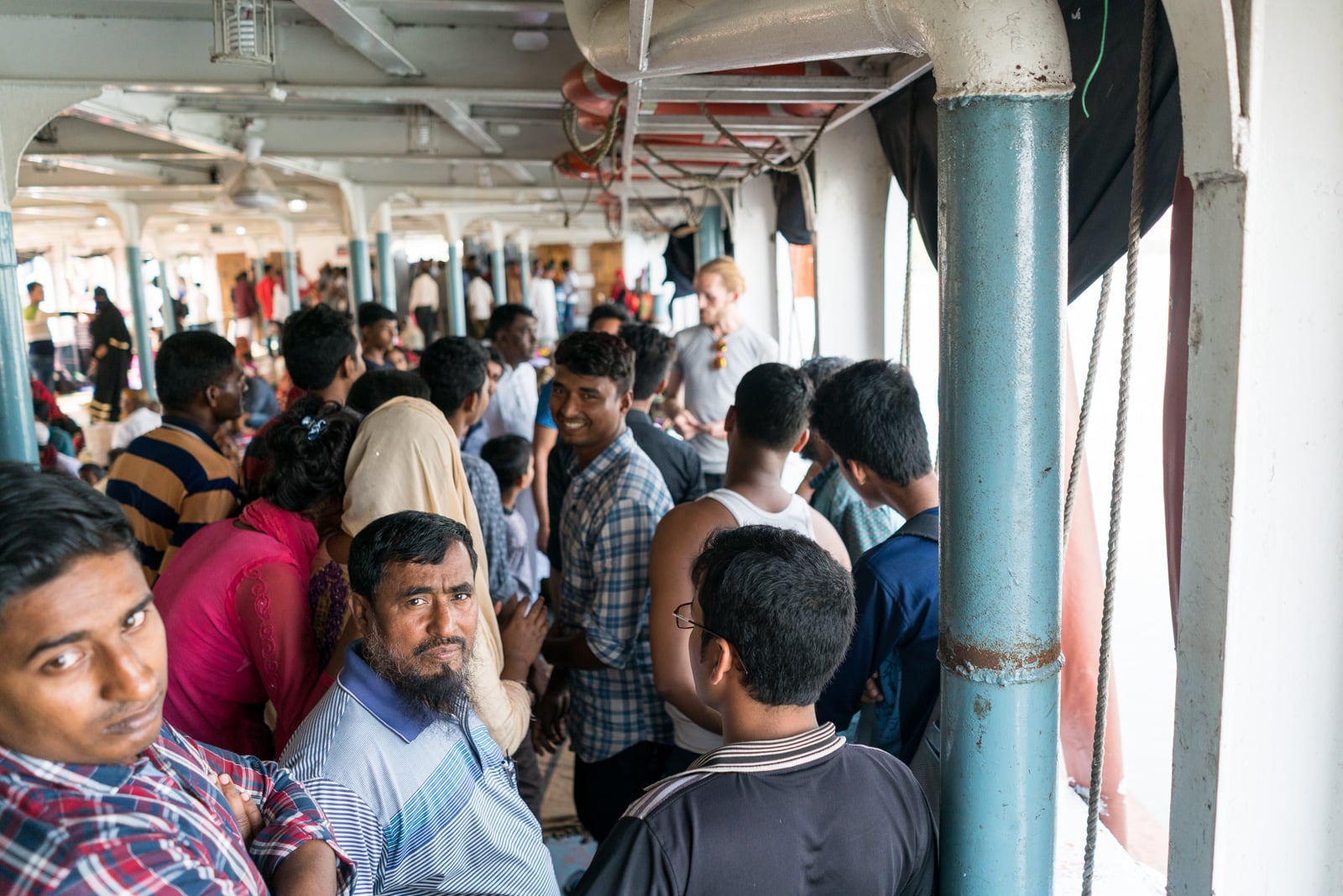 How to get a launch boat from Khulna to Dhaka via Hularhat - Bangladeshi people staring - Lost With Purpose travel blog