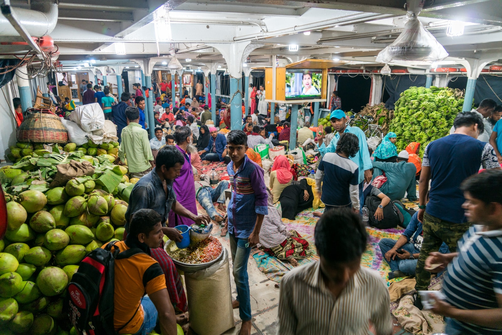 Launches from Hularhat to Dhaka, Bangladesh - Below deck of boat filled with people at night - Lost With Purpose travel blog