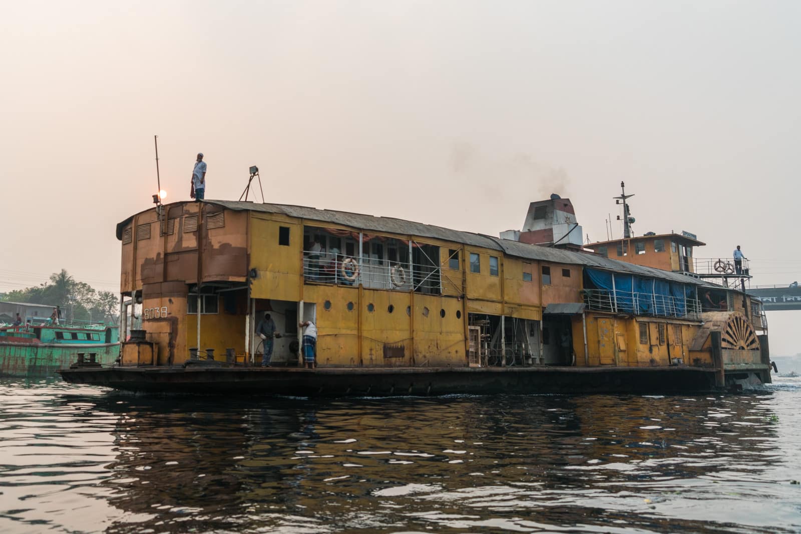 Launches from Hularhat to Dhaka, Bangladesh - Rocket Steamer pulling into Dhaka River Port - Lost With Purpose travel blog