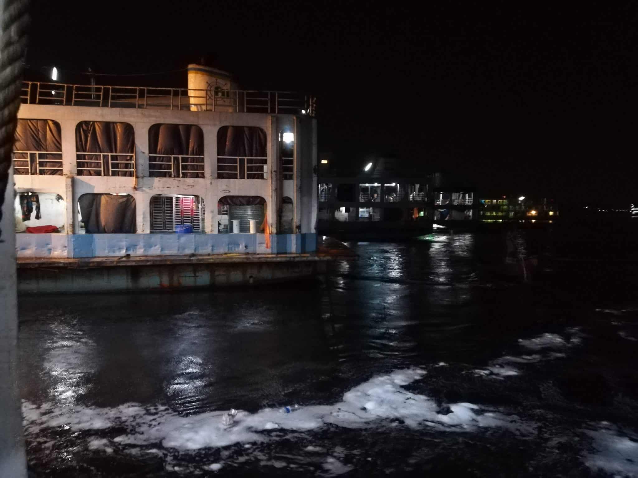 Launches from Hularhat to Dhaka, Bangladesh - Pulling into Dhaka port - Lost With Purpose travel blog