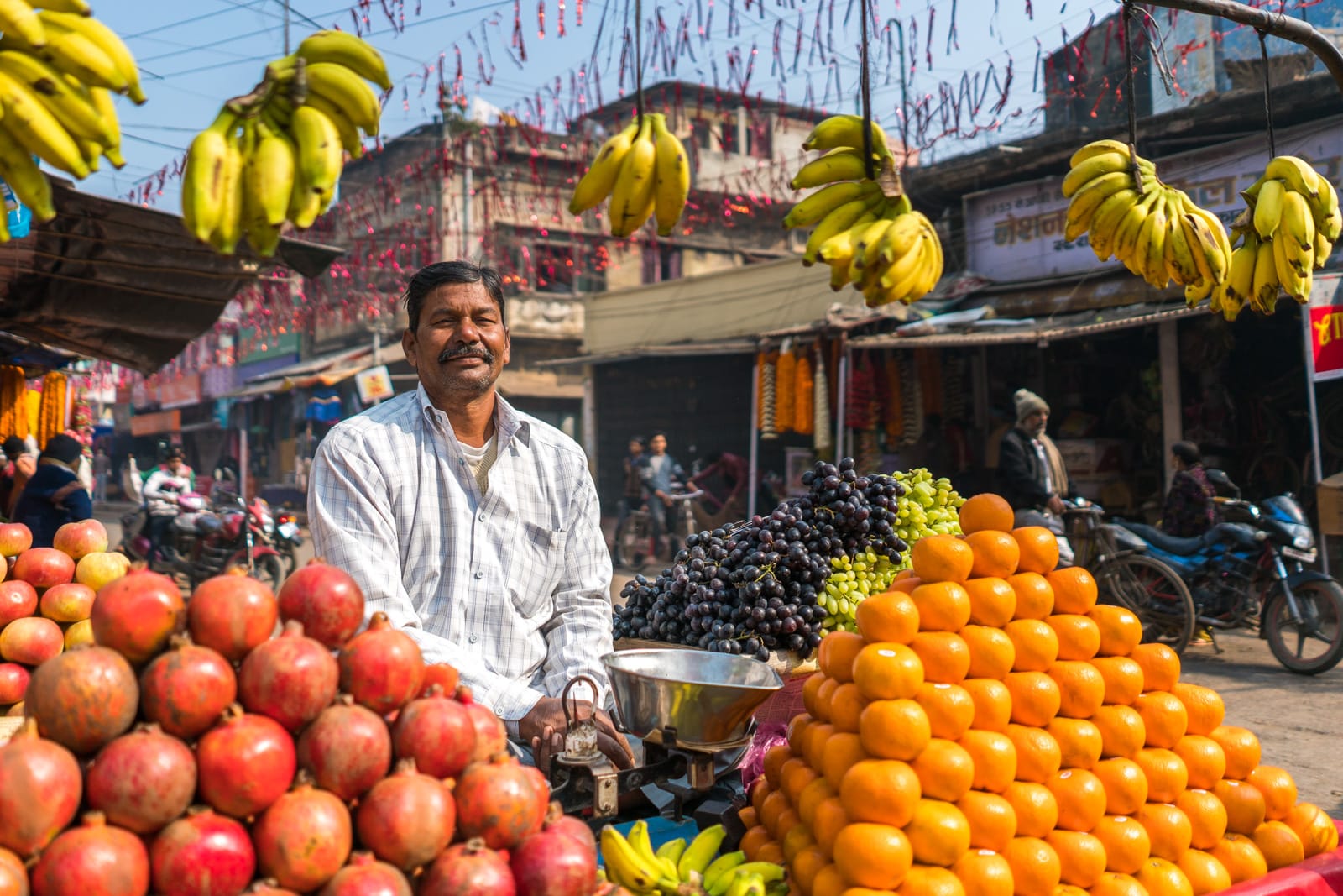 Easy ways to be a more responsible traveler - Fruit salesman in Bihar, India - Lost With Purpose travel blog