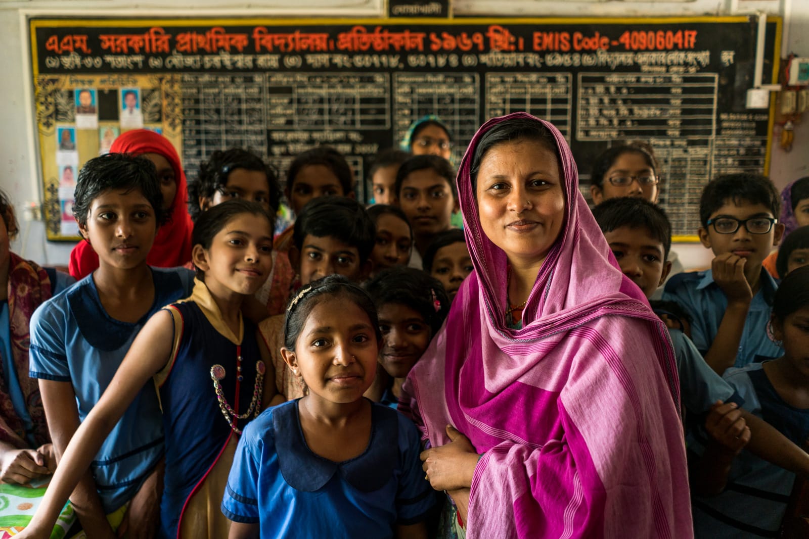 Easy ways to travel more responsibly - School teacher and girls in Hatiya, Bangladesh - Lost With Purpose travel blog