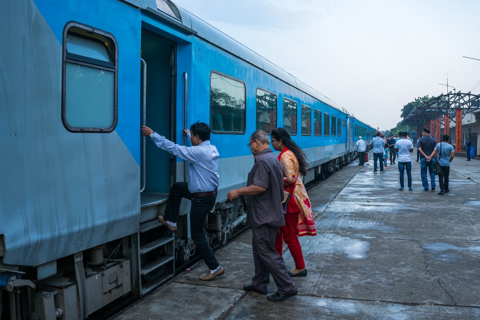 How to take the train from Dhaka to Kolkata - People boarding the Maitree Express train at Cantonment station - Lost With Purpose travel blog