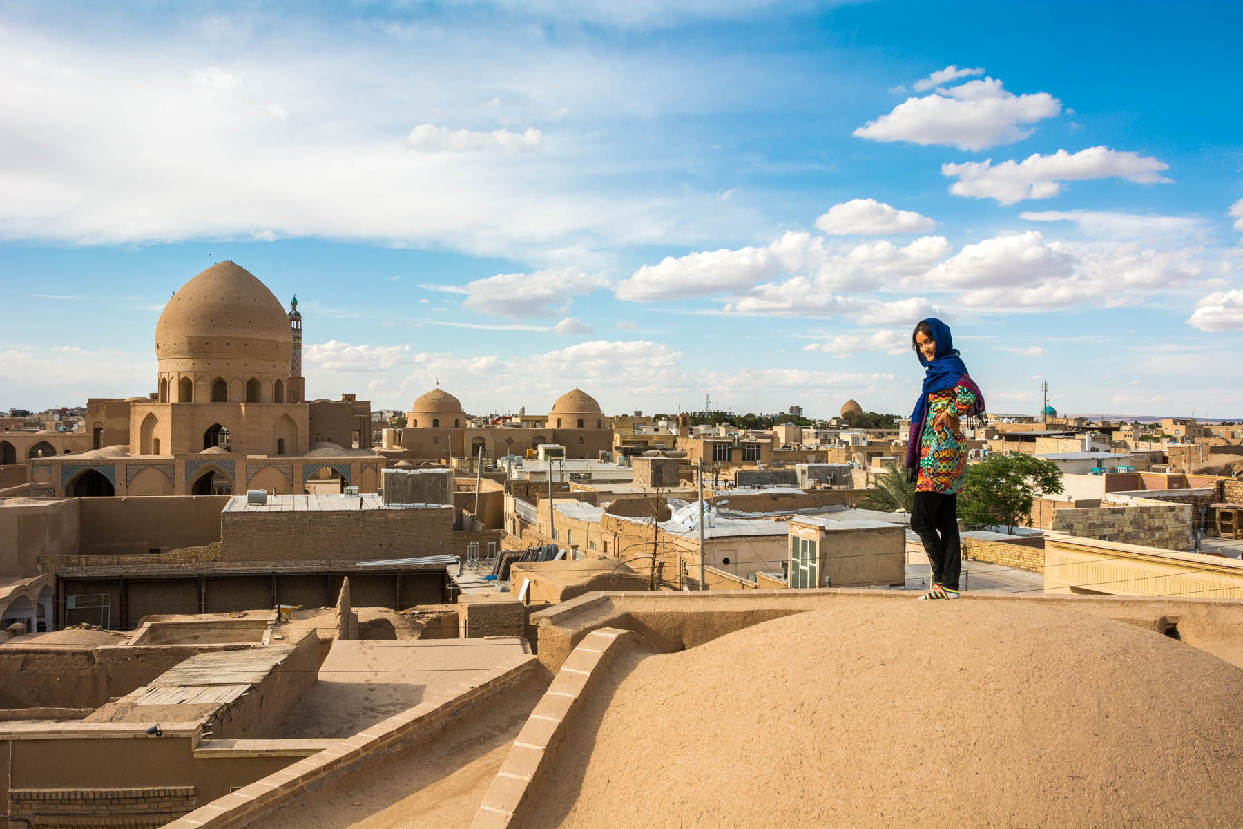 Easy ways to travel more responsibly - Alex in local clothes in Kashan, Iran - Lost With Purpose travel blog