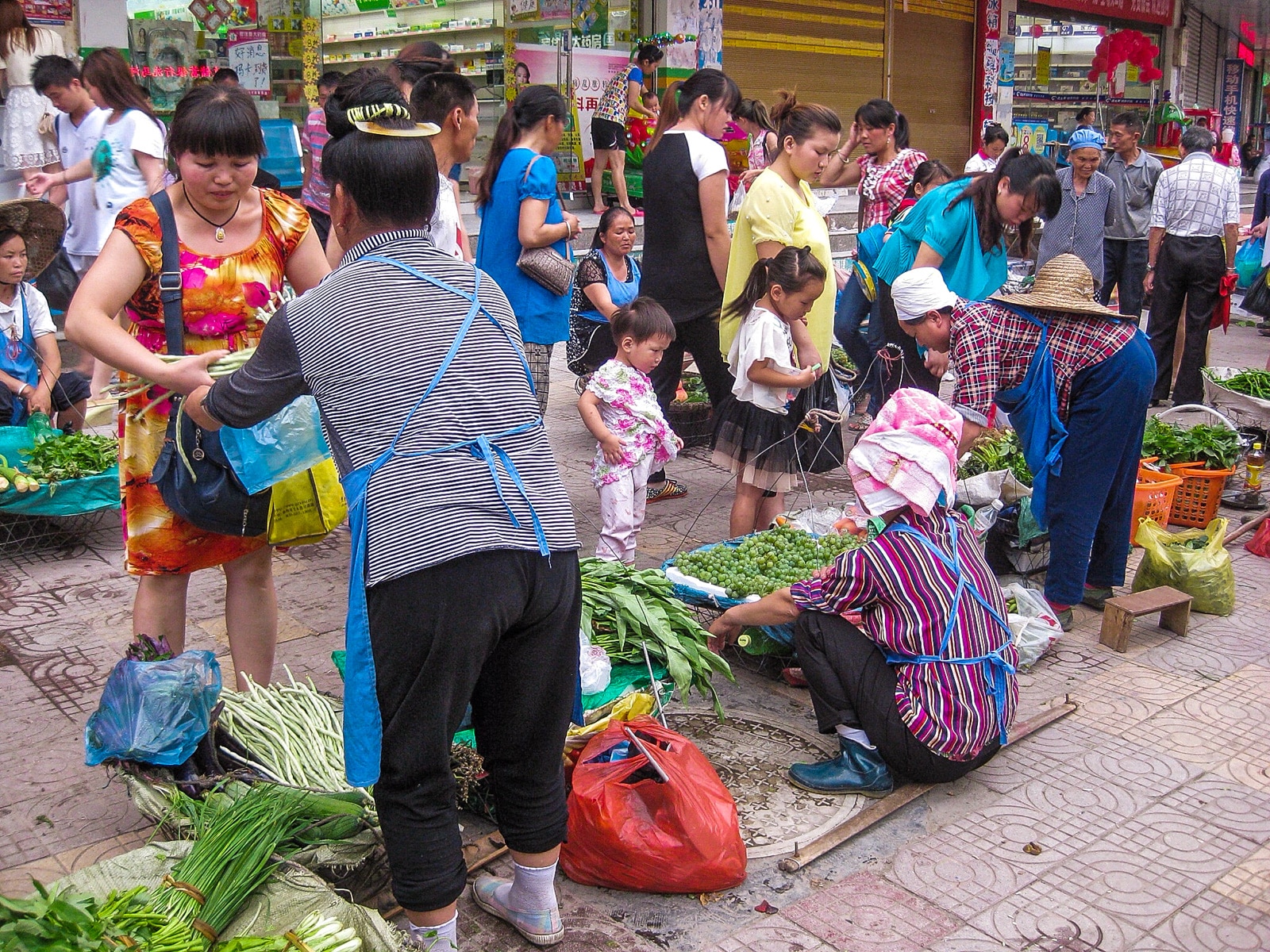 Exploring off the beaten track villages in Guizhou, China - Sunday market in Kaili