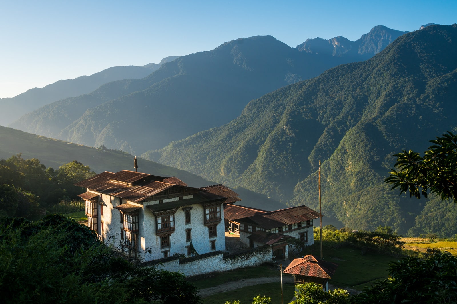 Stunning photos of Bhutan - Kuengarabten dzong at sunrise - Lost With Purpose travel blog