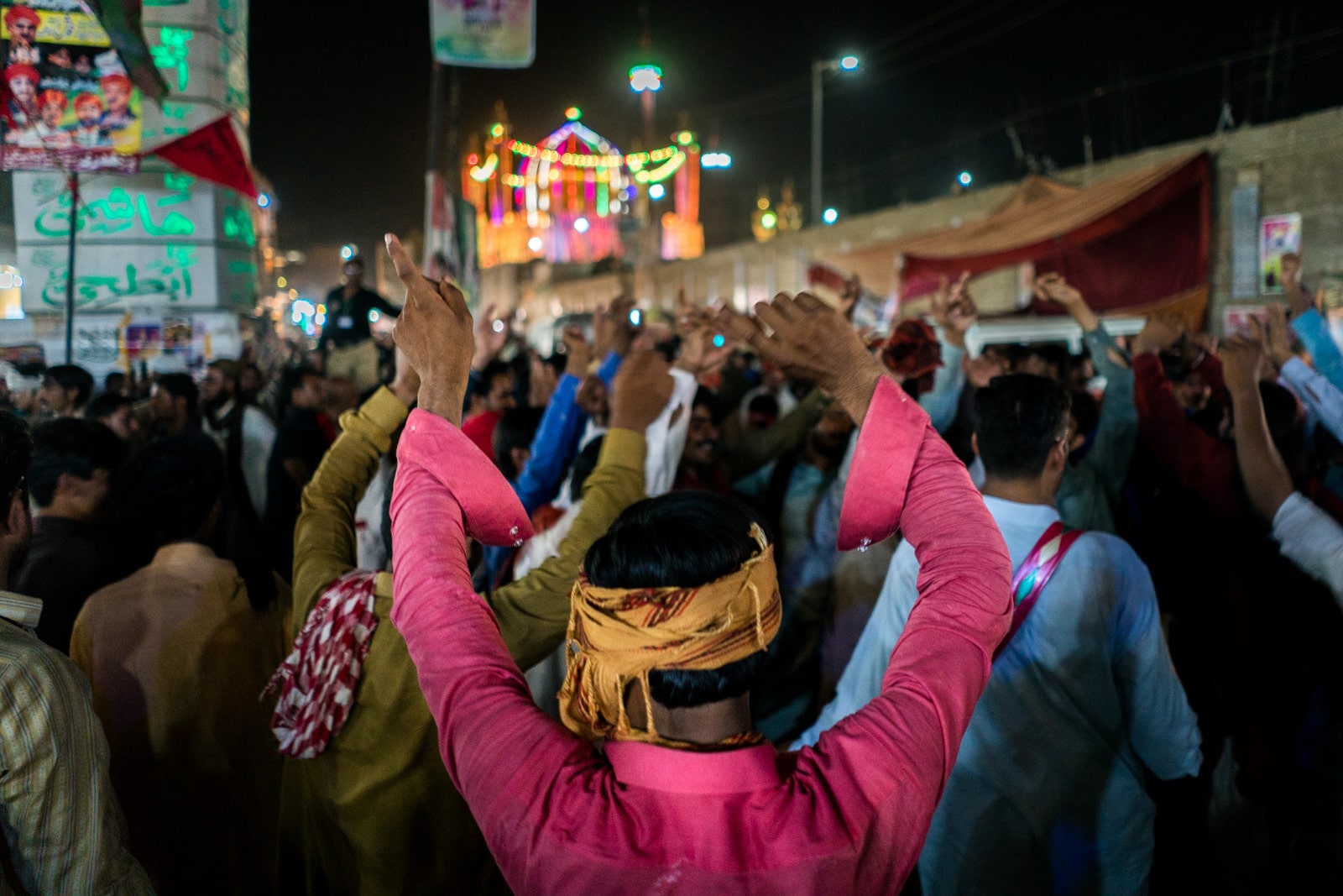 The Urs of Lal Shahbaz Qalandar in Sehwan, Pakistan - People dancing on the streets of Sehwan at night - Lost WIth Purpose travel blog