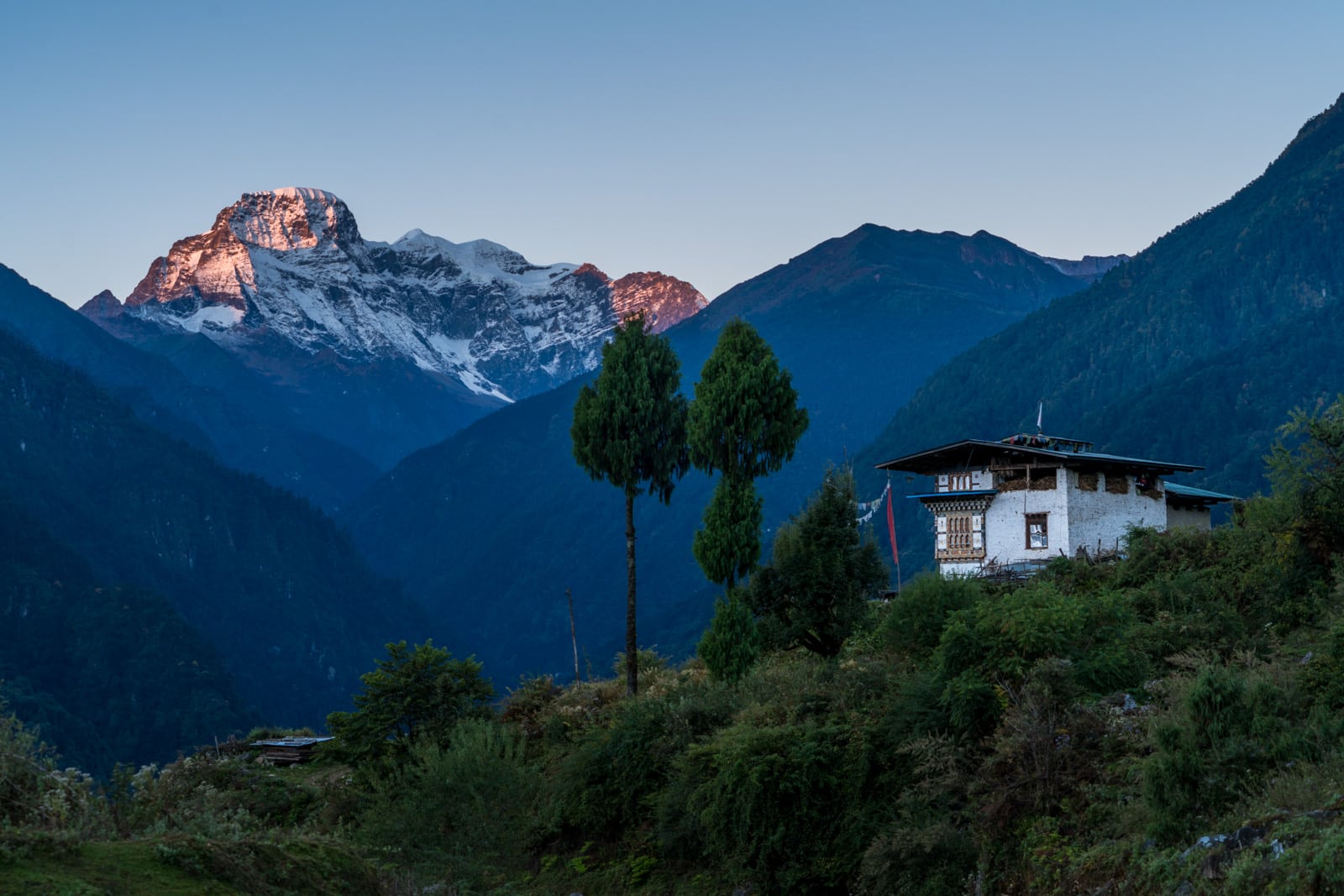 Stunning photos of Bhutan - Sunrise over mountains overlooking Gasa - Lost With Purpose travel blog