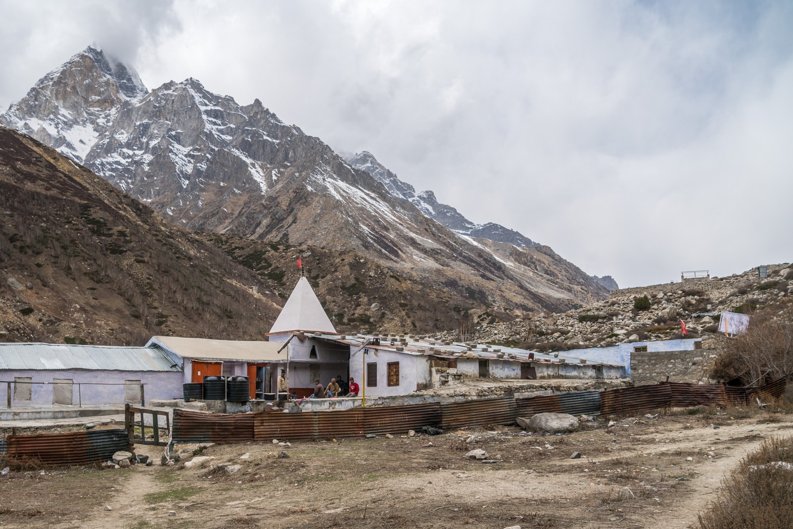 Lal Baba Ashram in Bhojwasa with mountains in the background