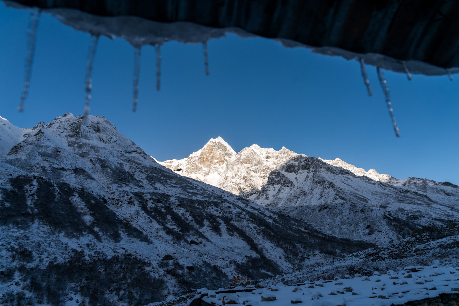 Icicles hanging from the roof of Lal Baba Ashram in Bhojwasa