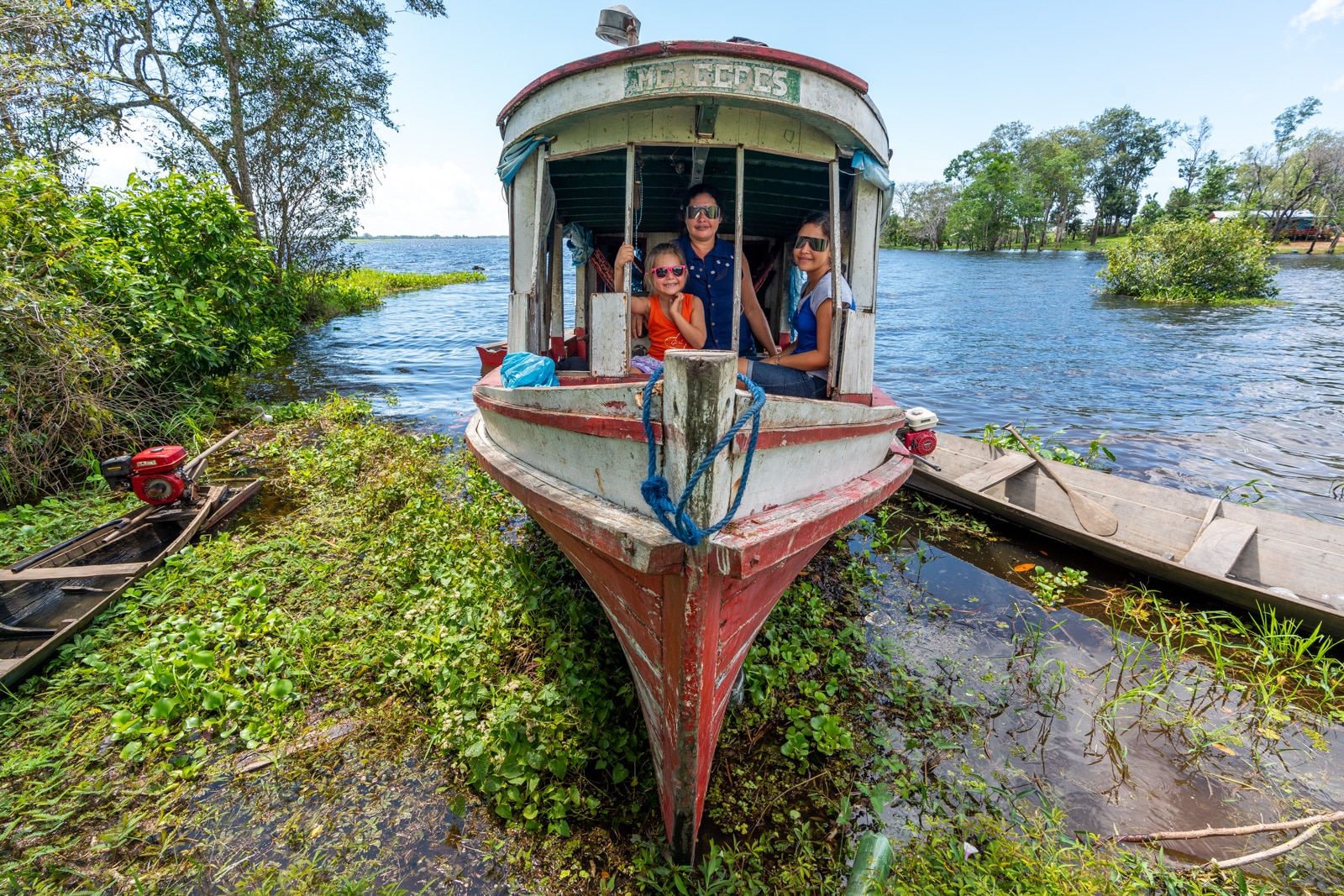 OneSight's mobile eye care clinic in the Brazilian Amazon - Family of girls on a boat - Lost With Purpose travel blog