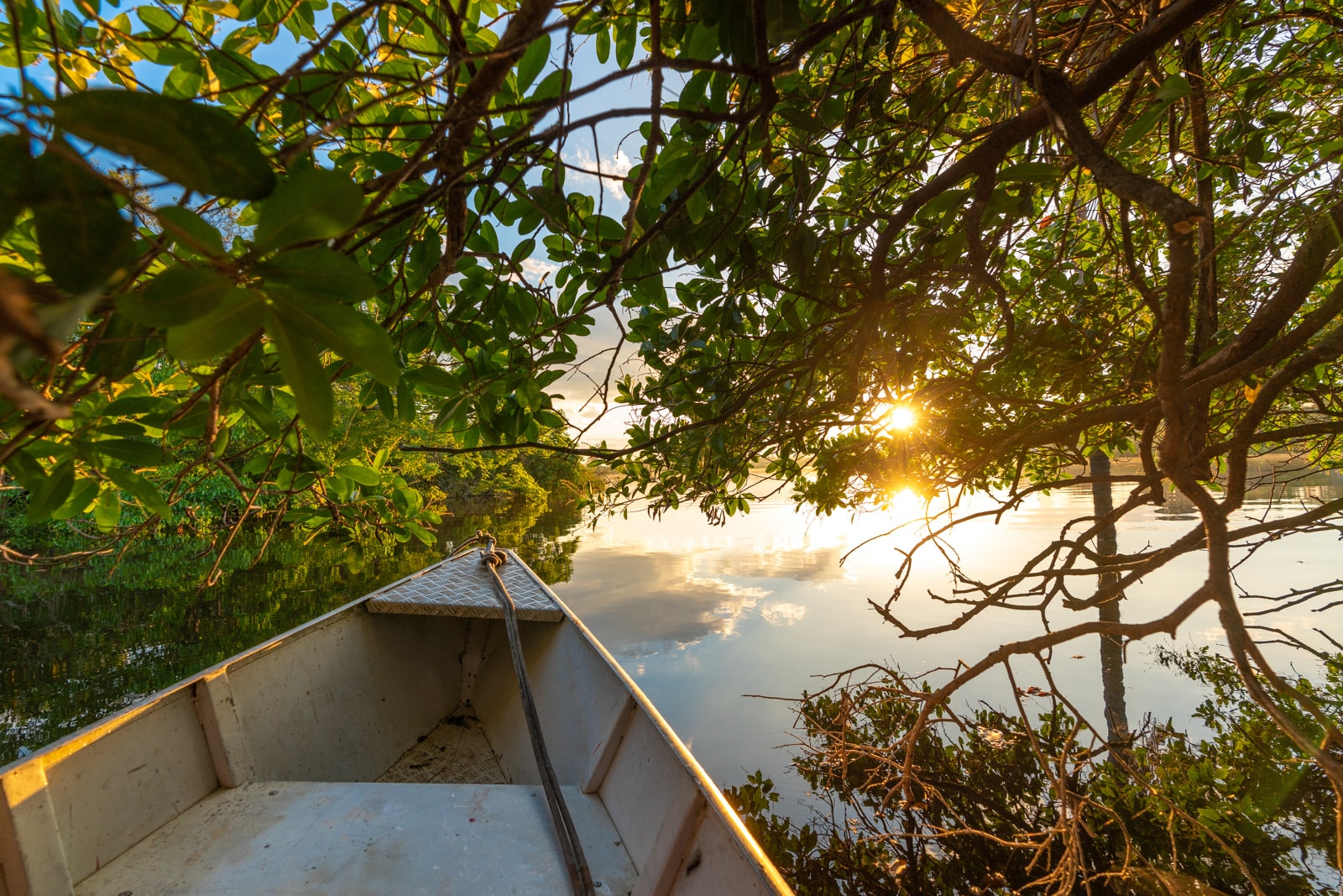 OneSight's mobile eye care clinic in the Brazilian Amazon - Boating on the Amazon River at sunrise - Lost With Purpose travel blog