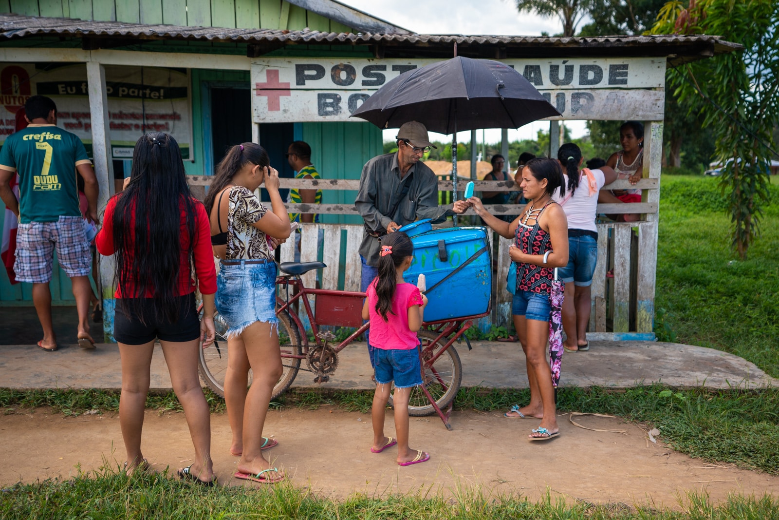 OneSight's mobile eye care clinic in the Brazilian Amazon - Alex selling popsicles - Lost With Purpose travel blog