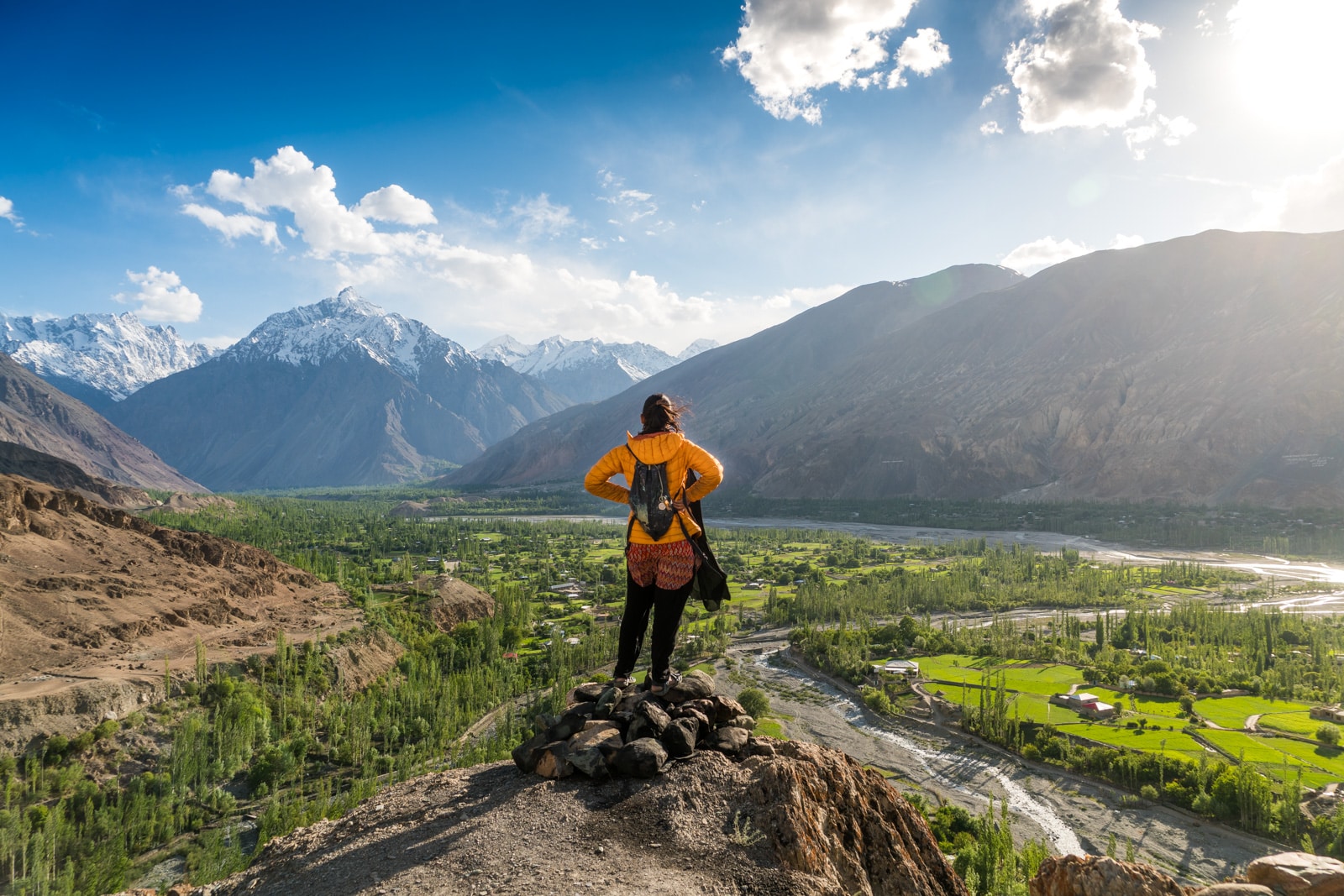 Reverse culture shock from long-term travel - Standing on a rock overlooking Yasin Valley in Gilgit Baltistan, Pakistan - Lost With Purpose travel blog