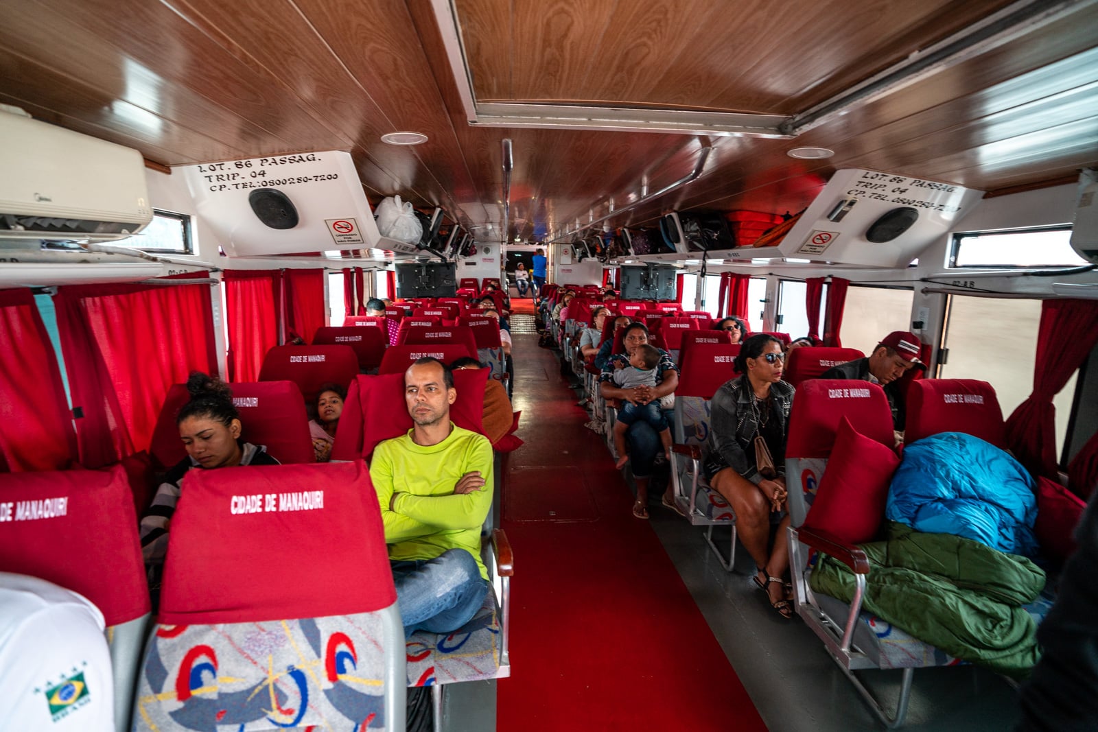 Taking the fast boat from Manaus, Brazil to Leticia, Colombia - Interior of the fast boat - Lost With Purpose travel blog