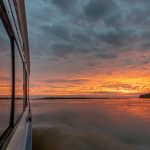 Taking the fast boat from Manaus, Brazil to Leticia, Colombia - Sunset from the water in Brazil - Lost With Purpose travel blog