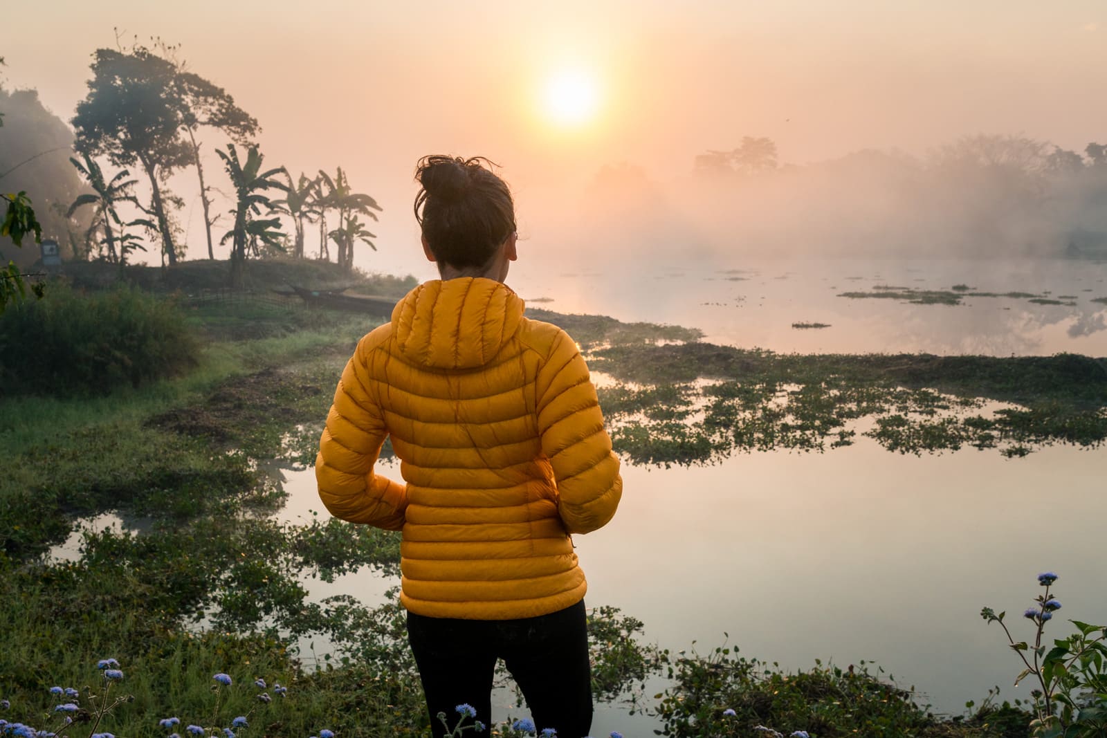 How I afford full-time travel - Patience on Majuli river island in Assam, India at sunrise - Lost With Purpose travel blog