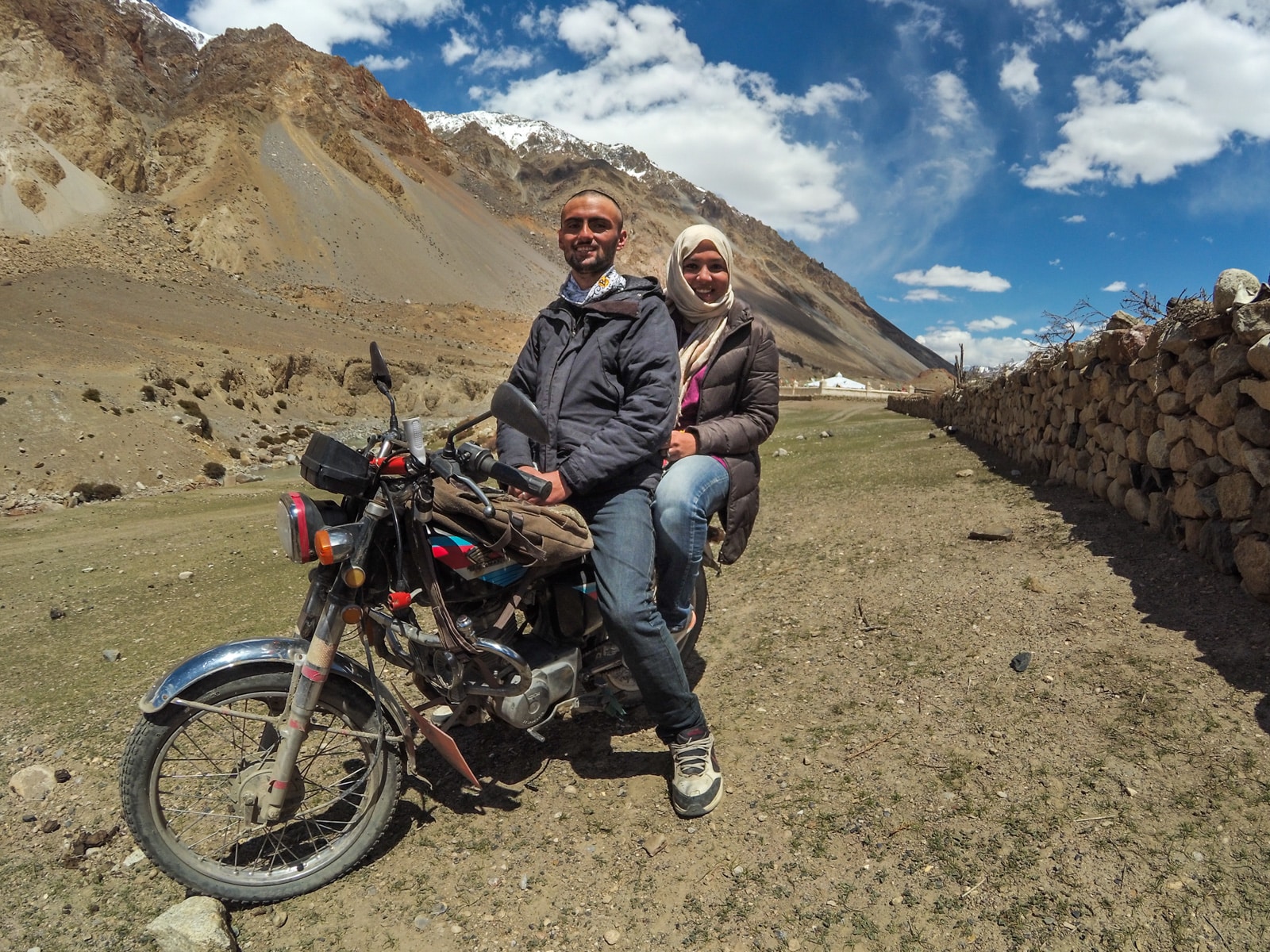 Bossy travelers interview with Aneeqa, head of Pakistan's first female-run tour company - Aneeqa on a motorbike in Gilgit Baltistan