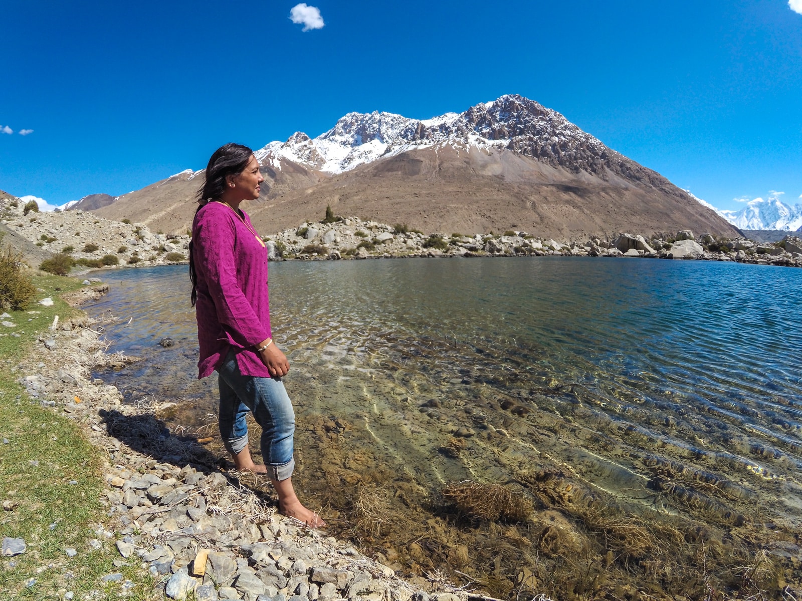 Bossy travelers interview with Aneeqa, head of Pakistan's first female-run tour company - Aneeqa at a lake in Gilgit Baltistan