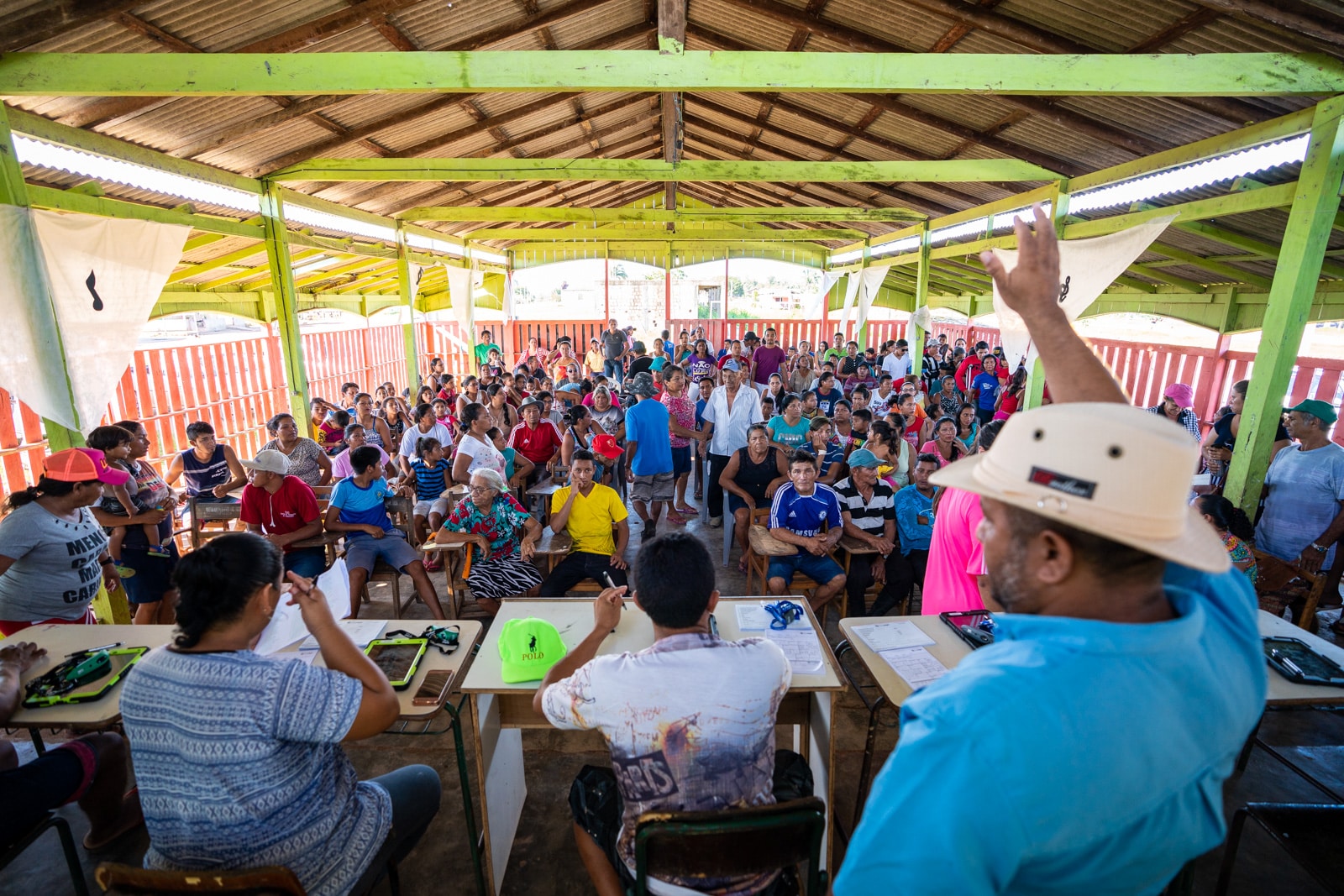 Reflections - Patients waiting their turn at a OneSight eye clinic in Cuia, Brazil - Lost With Purpose travel blog