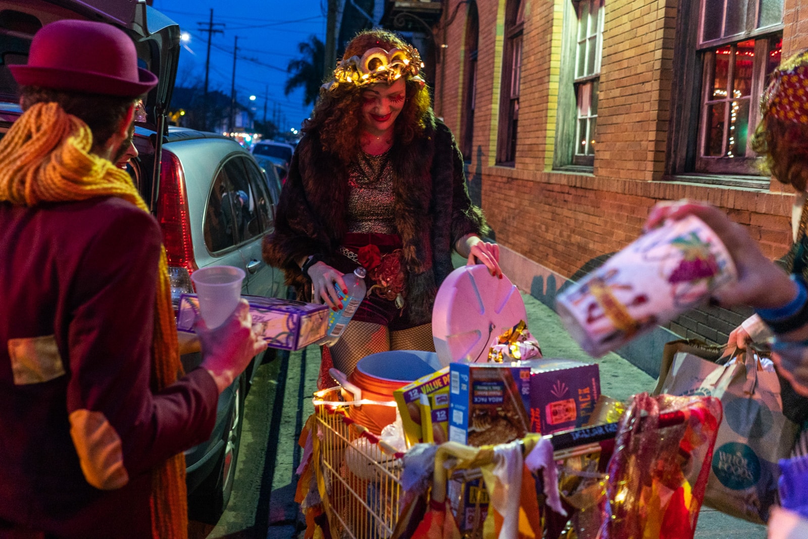 Filling a shopping cart with snacks and alcohol for a Mardi Gras parade in New Orleans