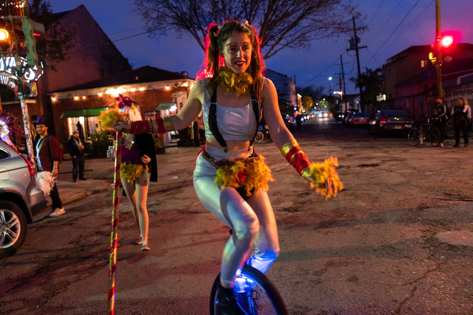 Girl riding a unicycle in New Orleans