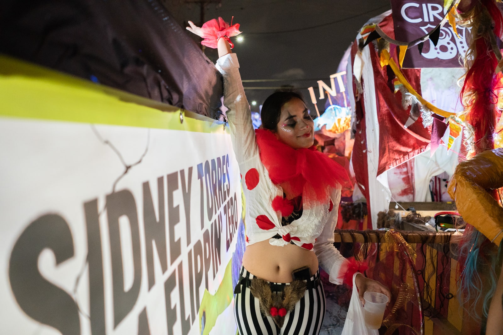 Alex in a classic clown Mardi Gras costume in New Orleans, LA