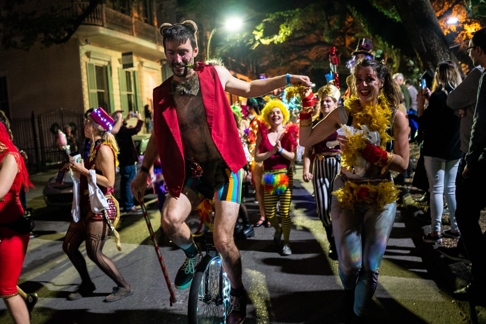 Boy riding a unicycle in the Krewe Boheme Mardi Gras parade in New Orleans