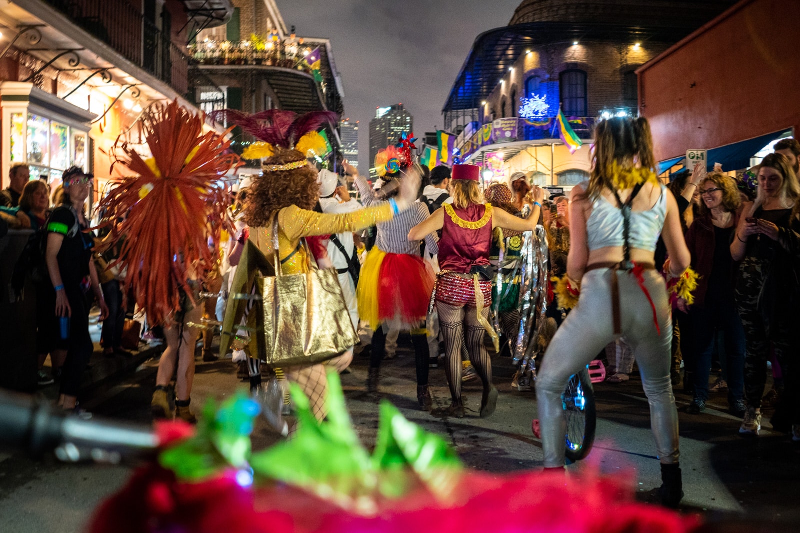 Krewe Boheme parade moving through the French Quarter in a Mardi Gras parade in New Orleans, LA