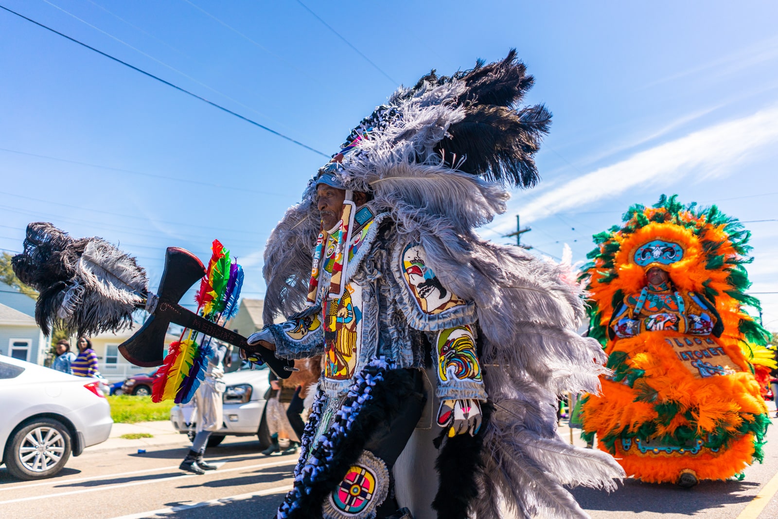 Mardi Gras Indian walking through the streets of New Orleans