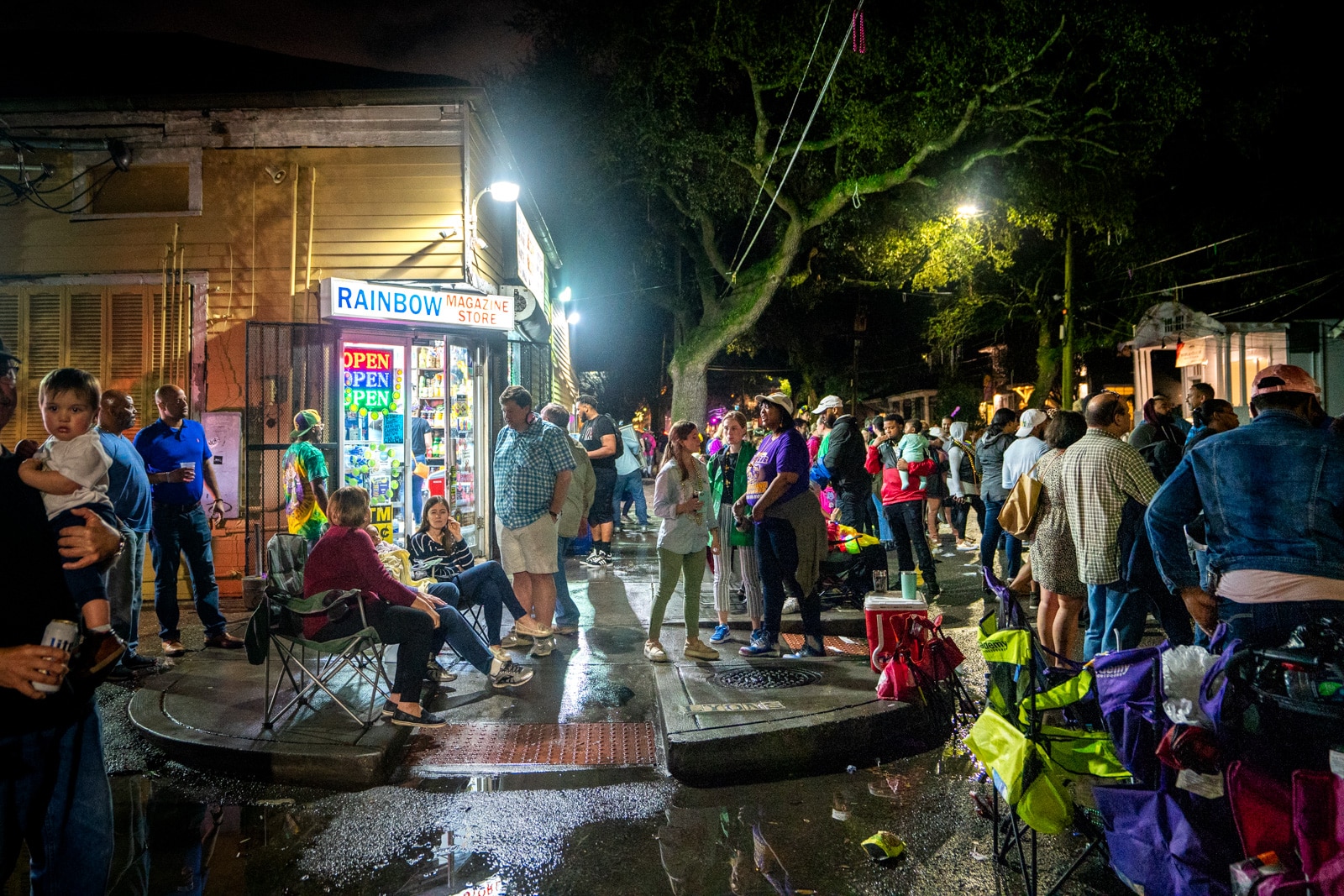 People in lawn chairs at a Mardi Gras parade