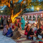 Women praying at the shrine of Mian Mir in Lahore, Pakistan