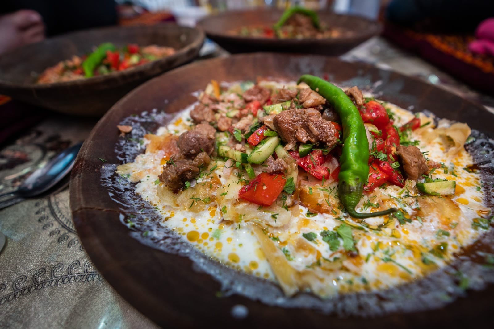 Bowl of traditional Tajik food called kurutob in Dushanbe, Tajikistan