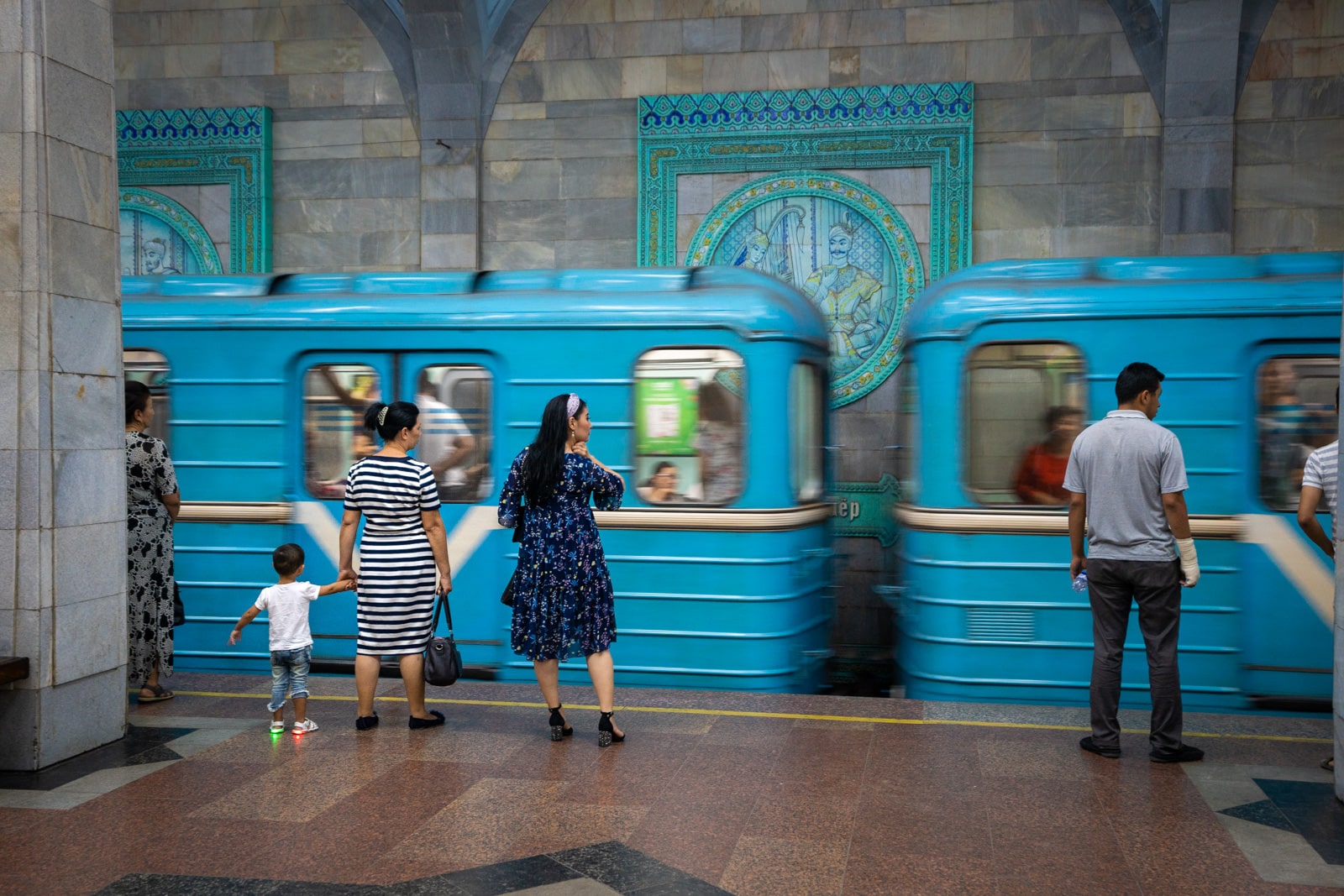 Metro train arriving in Alisher Navoi metro station in Tashkent, Uzbekistan