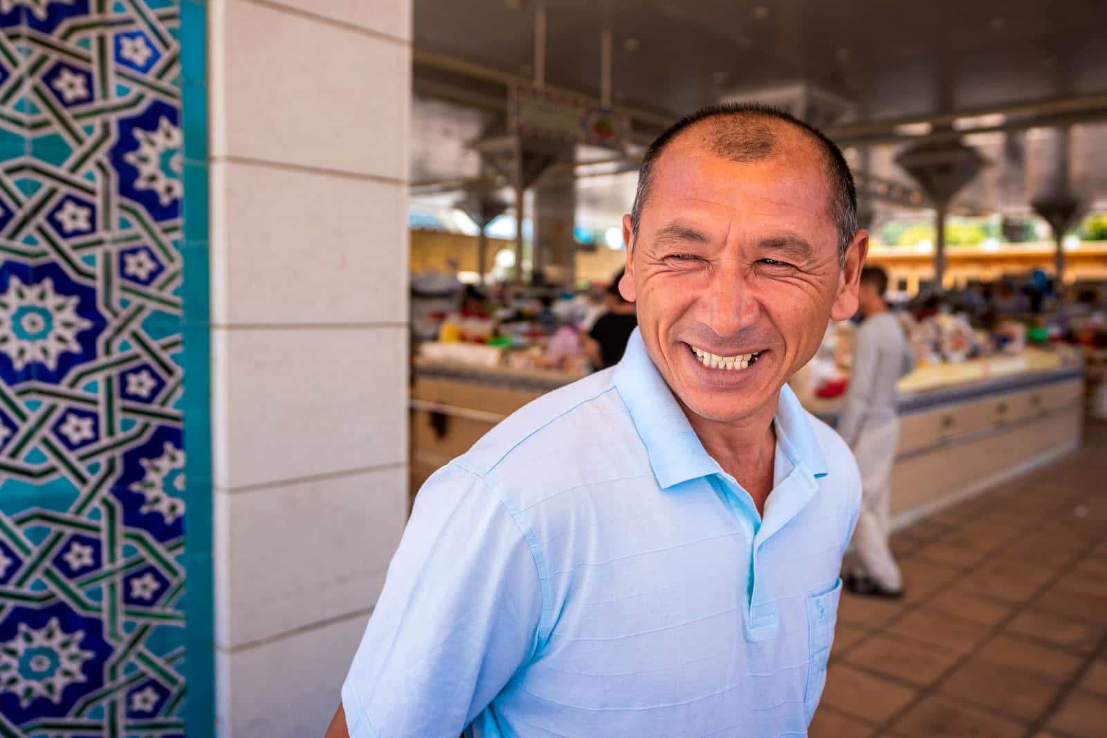 Laughing man in Alay Bazar, Tashkent, Uzbekistan