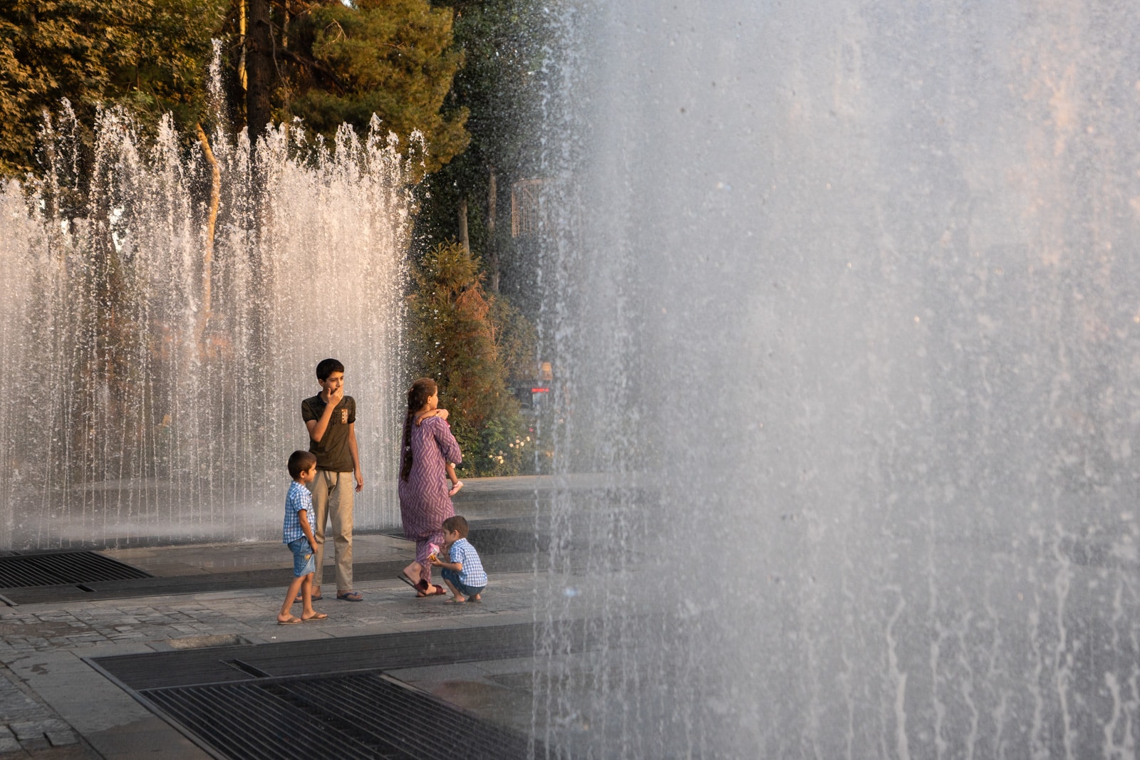 Locals walking in fountains in Dushanbe, Tajikistan