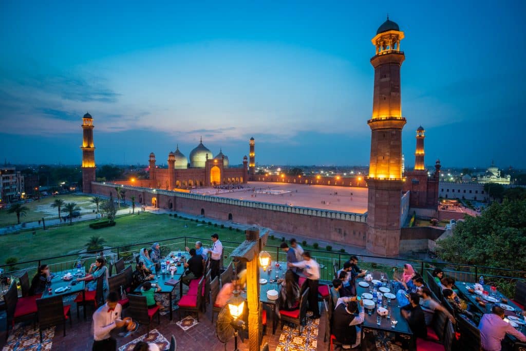 Evening dinner at Haveli Restaurant on Lahore's Food Street with a view of Badshahi Mosque